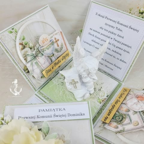Elegant First Holy Communion keepsake set with decorative plate, prayer cards, white gloves, and floral elements arranged on a light green and white display.