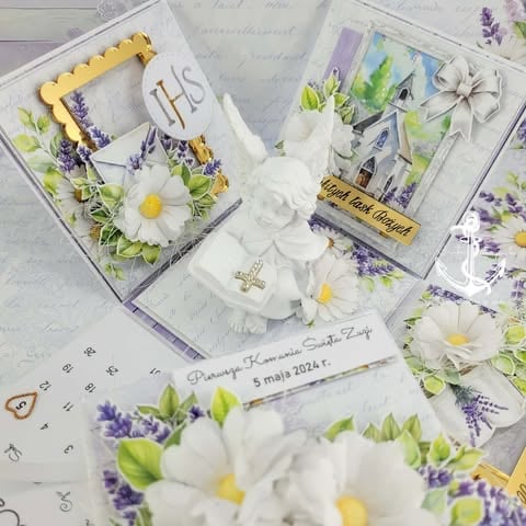 Handmade religious scrapbooking and card craft layouts with white flowers, purple lavender accents, and yellow decorative elements on white paper