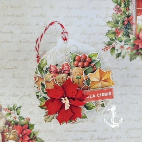 Vintage-style Christmas ornament with red poinsettia flower, candy cane, holly berries, and gold ribbon on decorative paper background