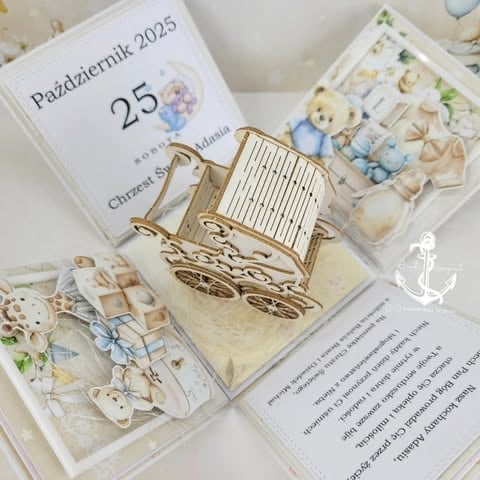 Baby christening gift set including a wooden stroller keepsake, October 2025 calendar, and decorative elements with Polish text