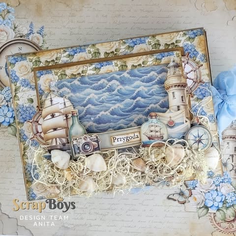 Decorative scrapbook page with nautical theme featuring sailing ship, lighthouse, waves, shells, and blue floral accents on cream background