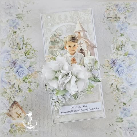 Religious first communion scrapbook layout with young boy in white clothing centered in floral frame surrounded by blue and white flowers