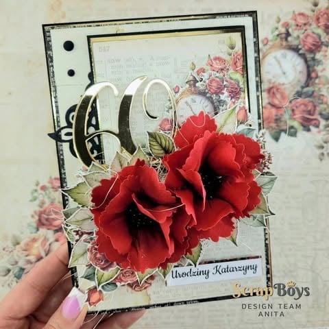Handmade birthday greeting card with large red 3D poppies, gold 60 numerals, vintage floral background, and 'Urodziny Katarzyny' text being held up