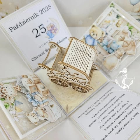 Christening gift box for Adasia with calendar Październik 2025, wooden baby crib, teddy bear, blue flowers, and 'Chrzest Święty Adasia' text with prayer on blue and cream background