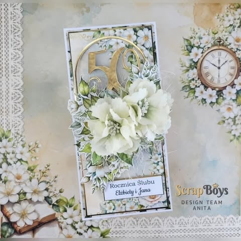 Handmade 50th wedding anniversary card with gold 50 numerals, white 3D peonies, vintage clock, and 'Rocznica Ślubu Elżbiety i Jana' text on scrapbook layout