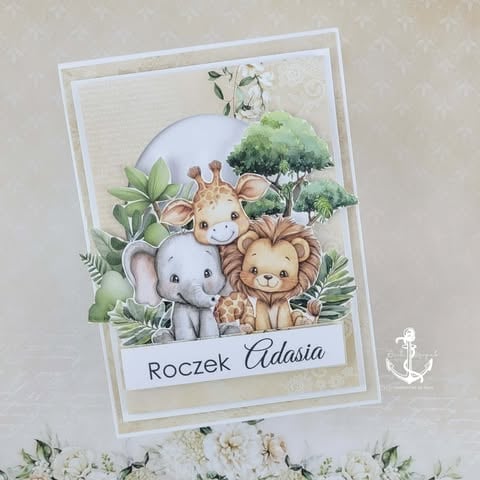 Handmade greeting card featuring watercolor safari animals with text Roczek Adasia