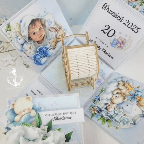 Christening keepsake for Mikołaj with calendar Wrzesień 2025, baby in white hat, wooden baby crib, blue stars, and 'Chrzest Święty Mikołaja' text on blue and white background