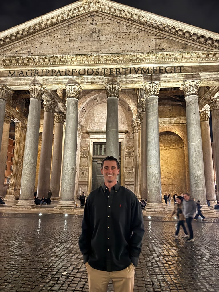 Andrew Donohue in front of the Pantheon in Rome at night