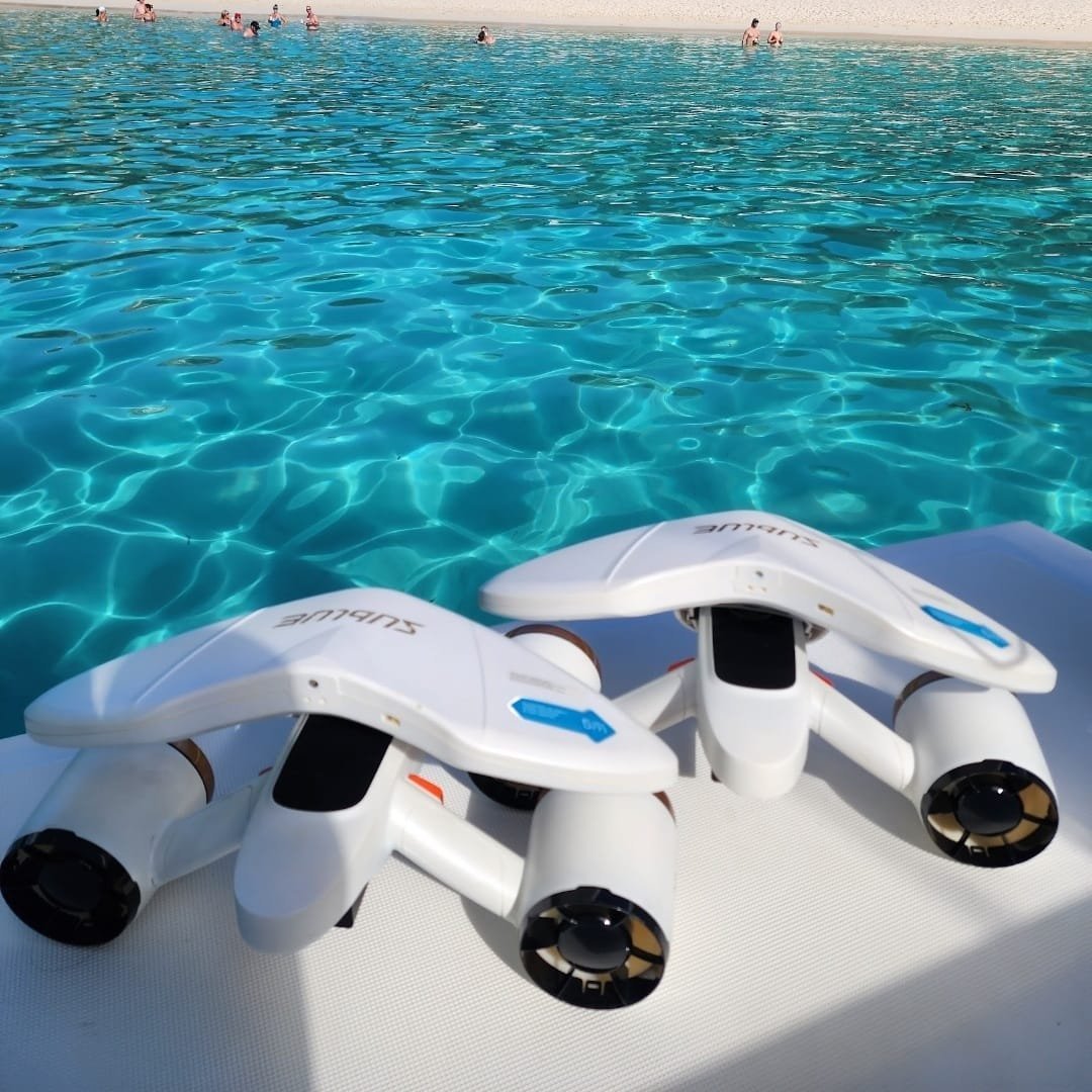 Good Ol' Days — underwater drones on a boat in crystal clear turquoise ocean