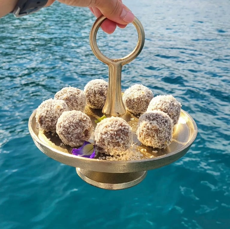 Coconut donut balls, a signature dessert by Chef Olga